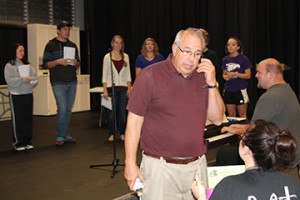 Director Tony Piazza, theater instructor at Allen, gives instruction to cast members during a rehearsal for "The 25th Annual Putnam County Spelling Bee."