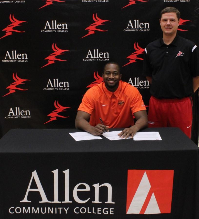 Igor Ibaka signed his National Letter of Intent with Oklahoma State University on November 12. Ibaka plans on graduating from Allen this summer and playing for OSU in the fall of 2015. With him at the signing was Allen head basketball coach Andy Shaw.
(Allen photo)