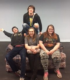Student Directors Judd Wiltse, Ian Malcolm, Chloe Bedell, and Kate Terhune, smile for a picture on the Allen Theater stage before the big show.
