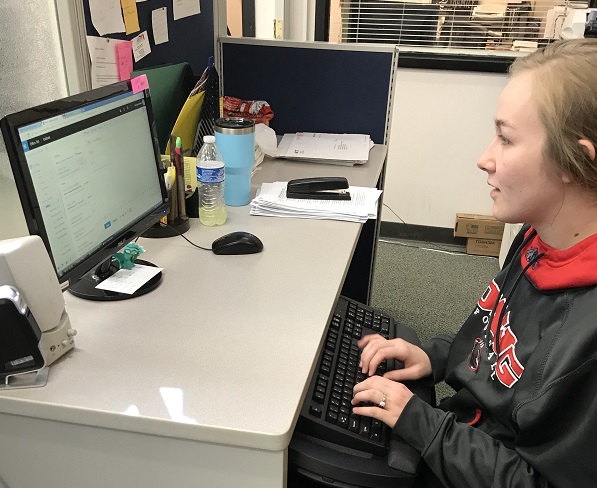 Emily Fritz, a freshman from Garnett, manages her e-mail.