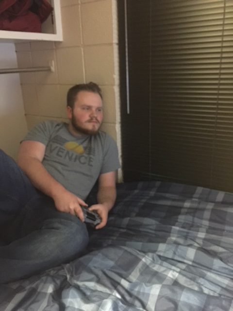 Freshman Jeremiah Pate makes the most of his small space in Horton Hall by setting up his TV in front of the bed, where he enjoys playing video games!