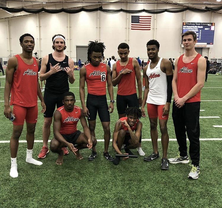 Members of the men’s track team pose after their Indoor Track Nationals meet. 