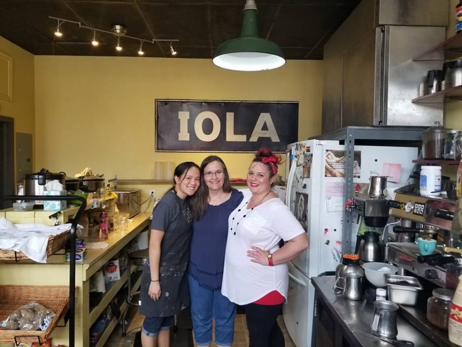 May 2018: Then Sophomore Joie Whitney poses for a photo with Around the Corner owners Cindy Lucas and Jessica Qualls during her afternoon shift at the coffee shop in Iola, KS.