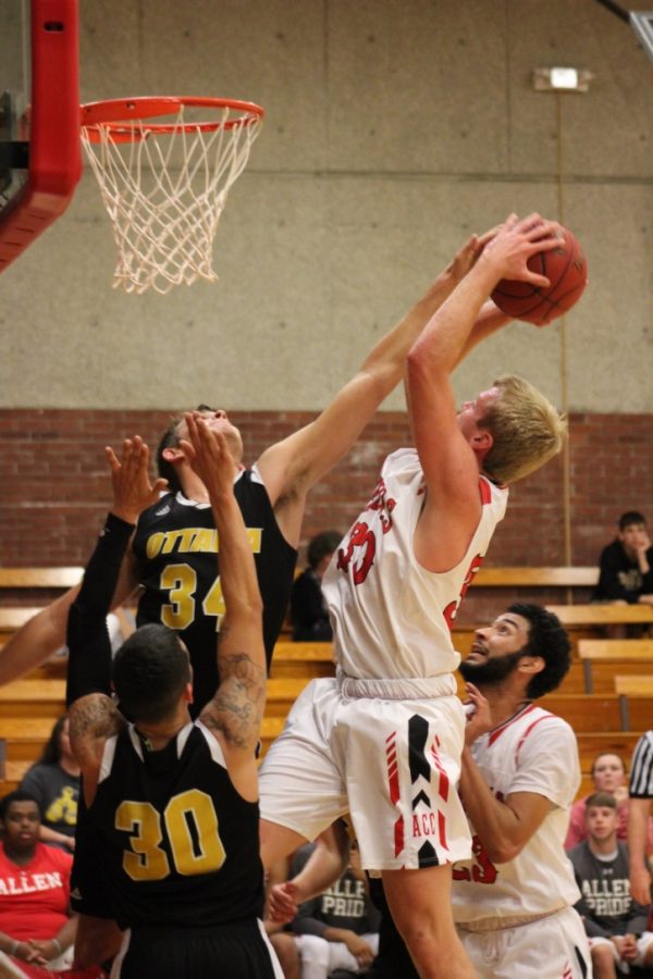 Freshman Brandon Gray goes up for the layup. Although he was close to getting blocked, he made the shot. 