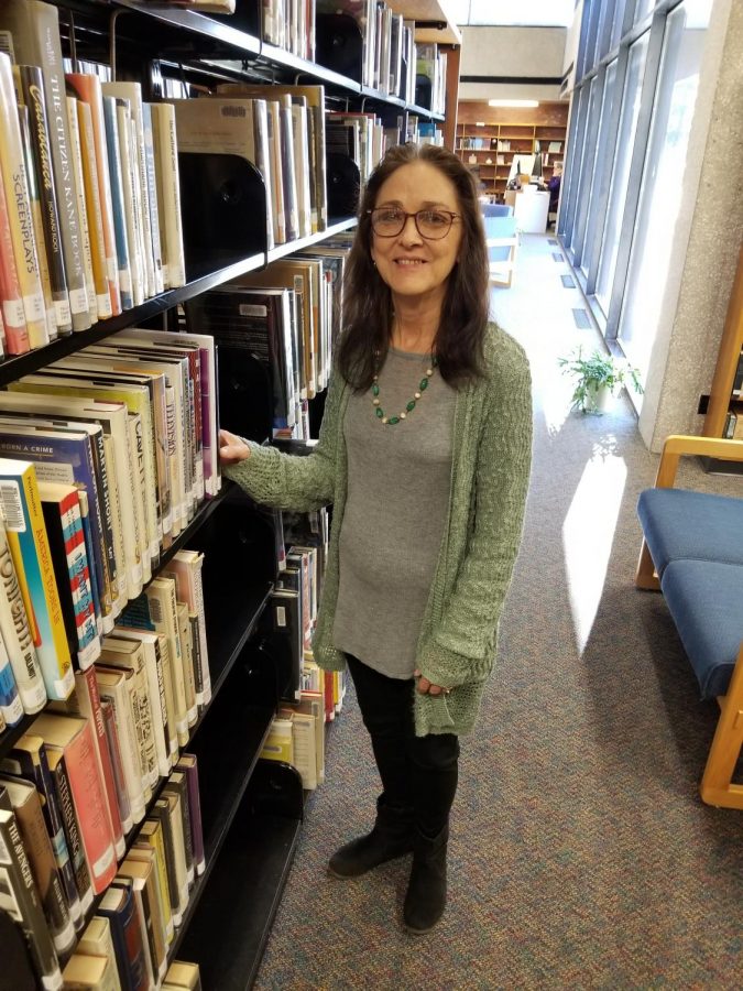 Tosca Harris, Dean of the Iola Campus and Fall 2018 PTK Adviser poses for a photo in the Allen Community College Library. 