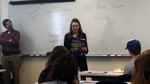 Lyndia Barnhart,  coordinator of Special Populations from Kansas State University, talks about PTK scholarships as Doug Joseph, Phi Theta Kappa advisor at Allens Burlingame Campus, looks on.