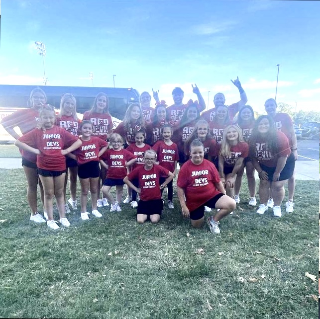 Red Devil cheer team meets with the Junior Devs cheer team