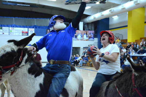 Some local Iola residents participate in Donkey Basketball. 